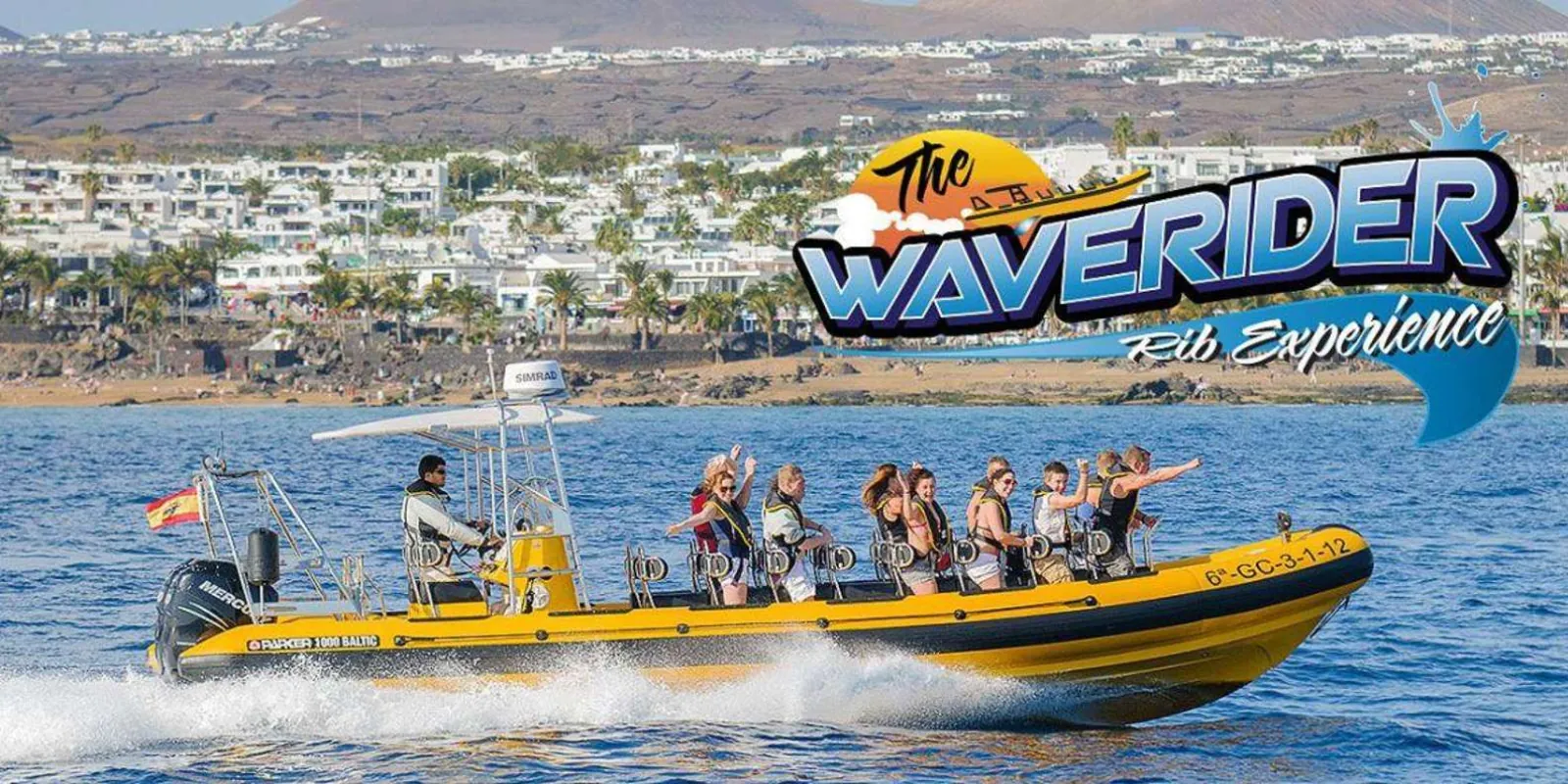 The Waverider RIB running close to the Puerto del Carmen shoreline with passengers aboard